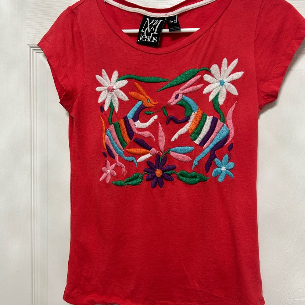 Multicolored floral embroidery on the front